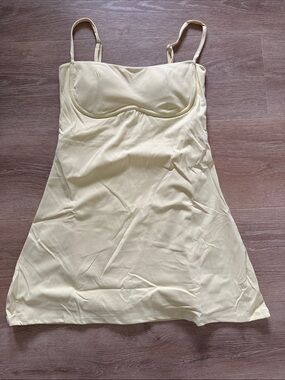Women’s athletic dress with built-in bra and built-in short shorts
